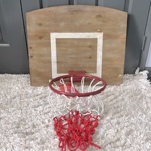 Decorate basketball hoop. Purchased from Hobby Lobby. Has hooks to hang.